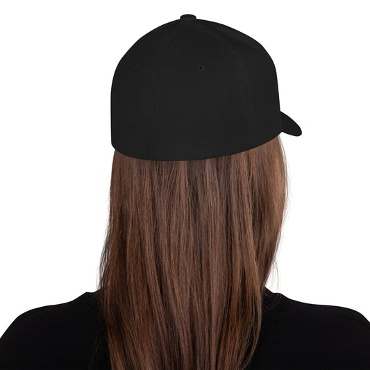 Back view of fitted structured twill cap for drummers by Cowbell & Groove, showing stretch-fit band and clean black design — subtle gift for musicians